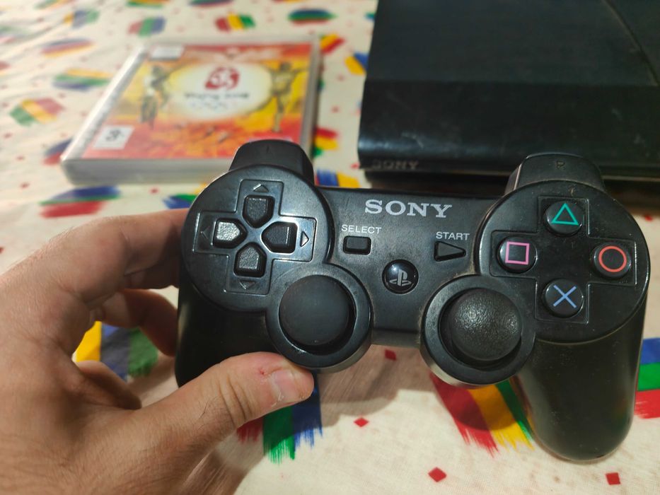 PS3 Super Slim com caixa em ótimo estado