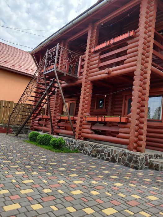 Проживання в дерев'яному будинку.