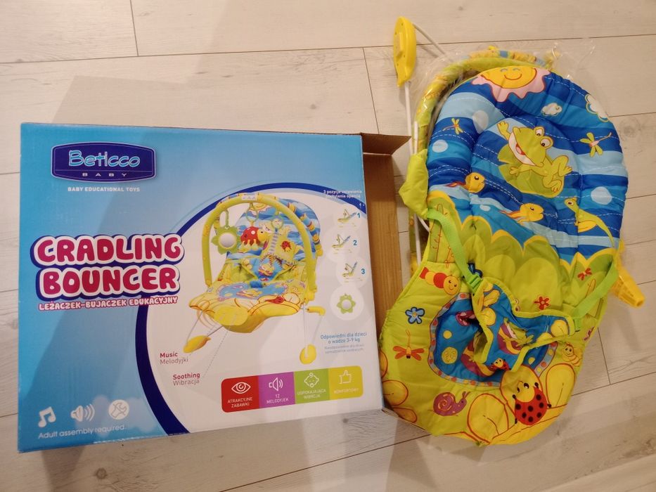 Leżaczek-bujaczek edukacyjny