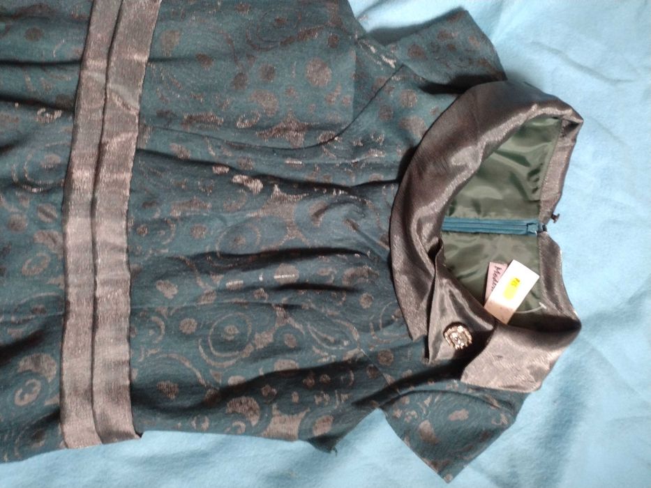 Sukienka elegancka jak nowa.