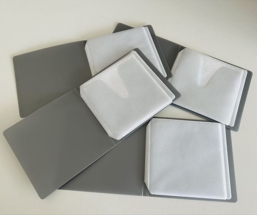 4 porta CDs / DVDs para armazenamento/ transporte de 32 unidades no total