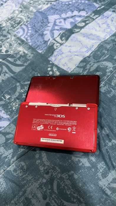 Nintendo 3DS com suporte.