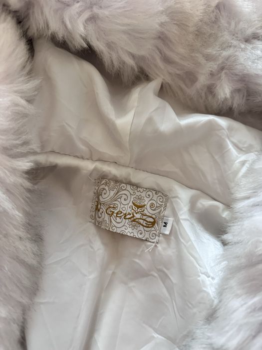 Безрукавка нова