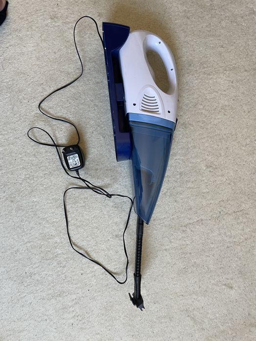 Aspirador portatil de parede.