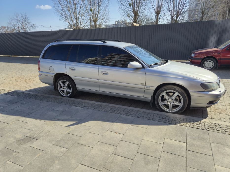 Opel Omega B.    —    2,5TD   M57.    
Про