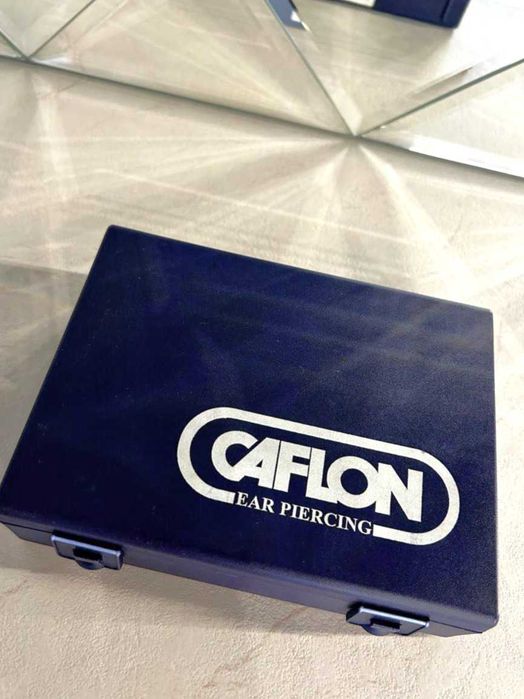 Система для проколу вух Caflon Blue