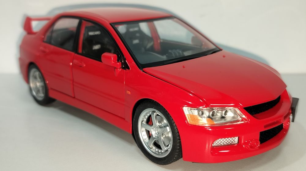Mitsubishi Lancer Evolution IX модель 1:22 Jinlifang Металл звук