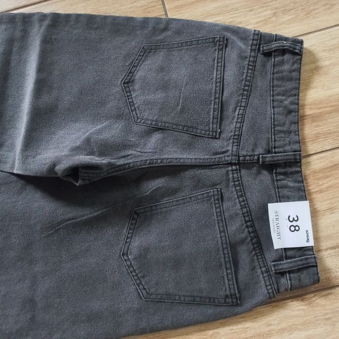 Damskie spodnie jeans  z szerokimi nogawkami-M