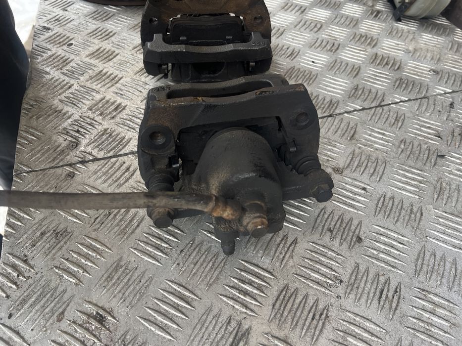 Задний суппорт Мазда сх7 mazda cx7