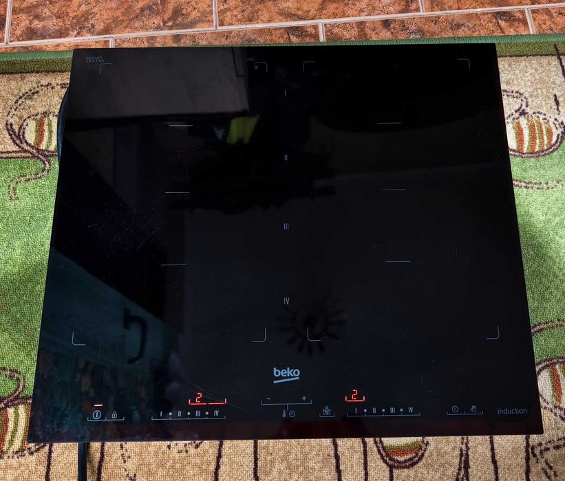 Płyta indukcyjna BEKO HII 68600 PT # Łączone pola