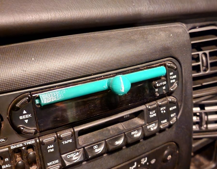 Тримач телефону в CD привід, перехідник