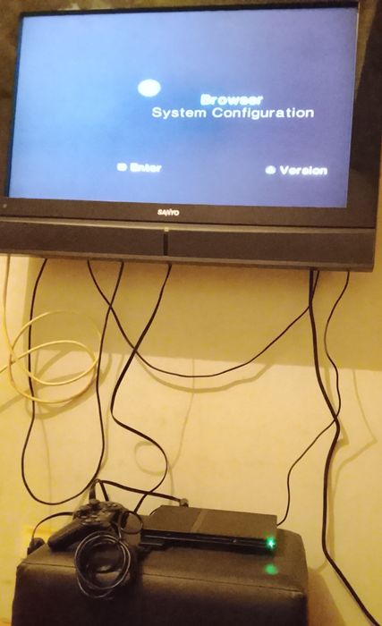 PlayStation 2 Slim + 1 Comando + Cabos