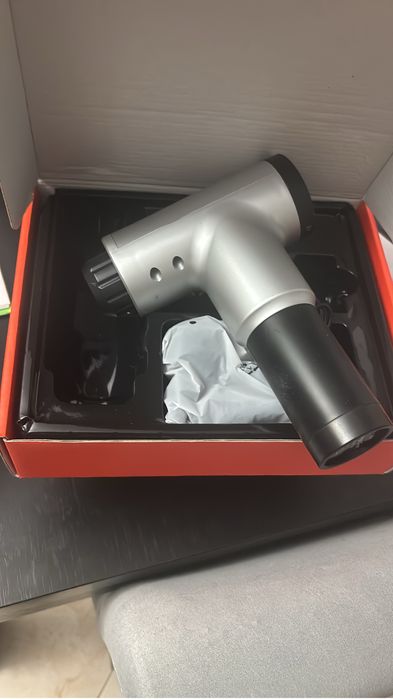 Pistola de massagem muscular