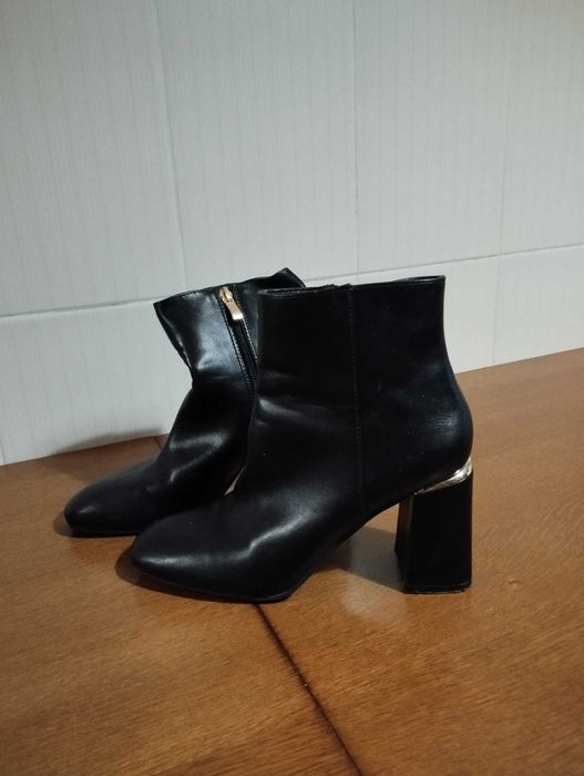 Botas e Sandálias de salto alto