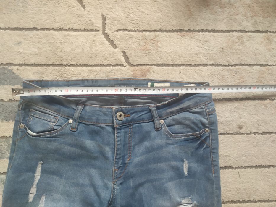 Spodnie skinny jeans z dziurami roz 31/L32