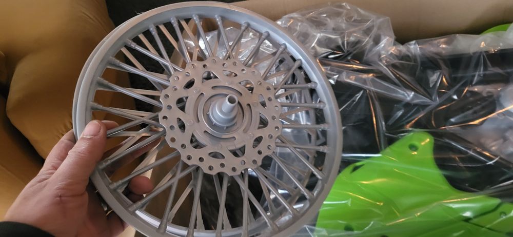 Mota bateria kawasaki nova em caixa