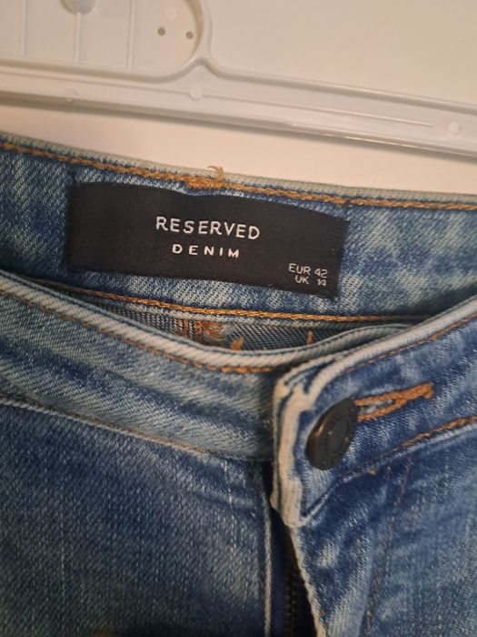 Jeansy 42 reserved  na dole zamki
