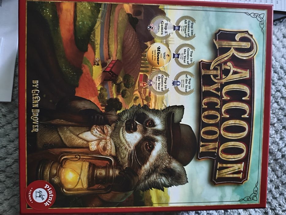 Raccoon Tycoon gra planszowa (DE) + PL instrukcja i karty pomocy. Stan idealny
