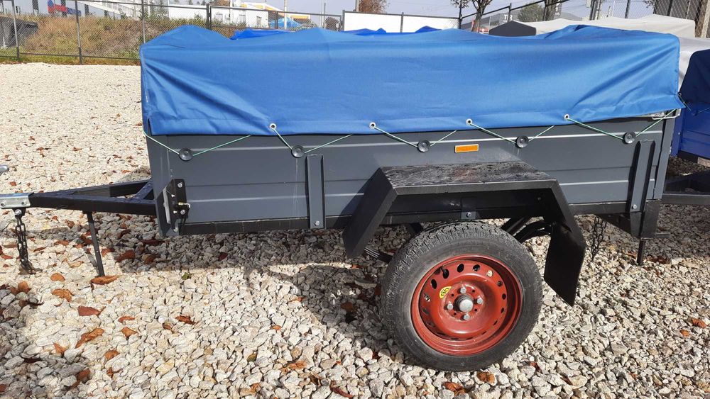 Прицеп до автомобіля / причеп легковий (з колесами і тентом з дугами)