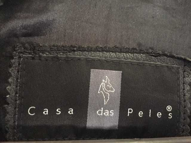 Revivalismo dos Anos 90. Casaco de pele, senhora.