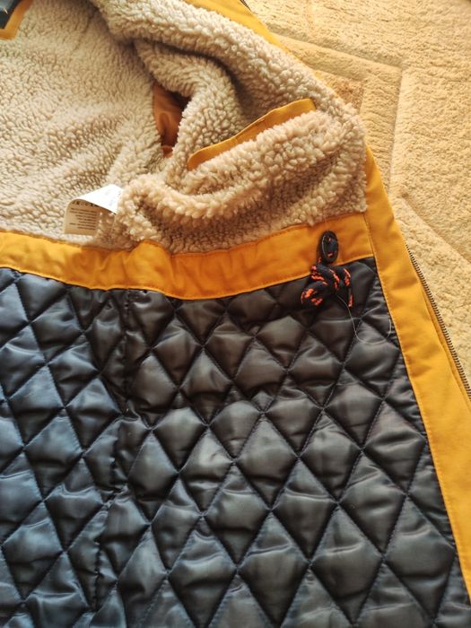 Продам рыжую парку ,мужскую