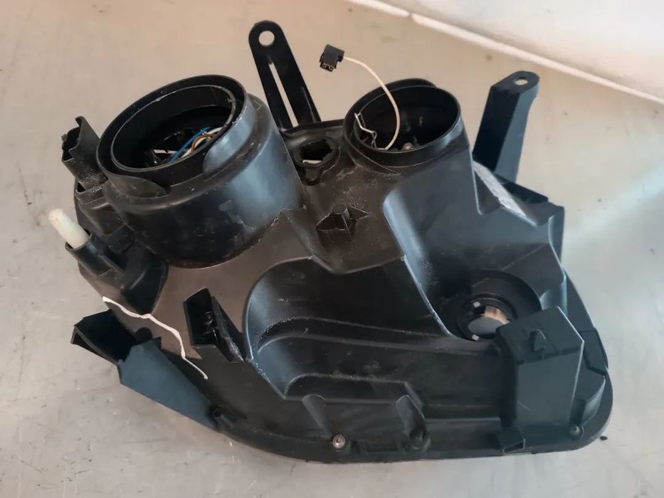 ÓTICA / FAROL DACIA DUSTER - ESQUERDO