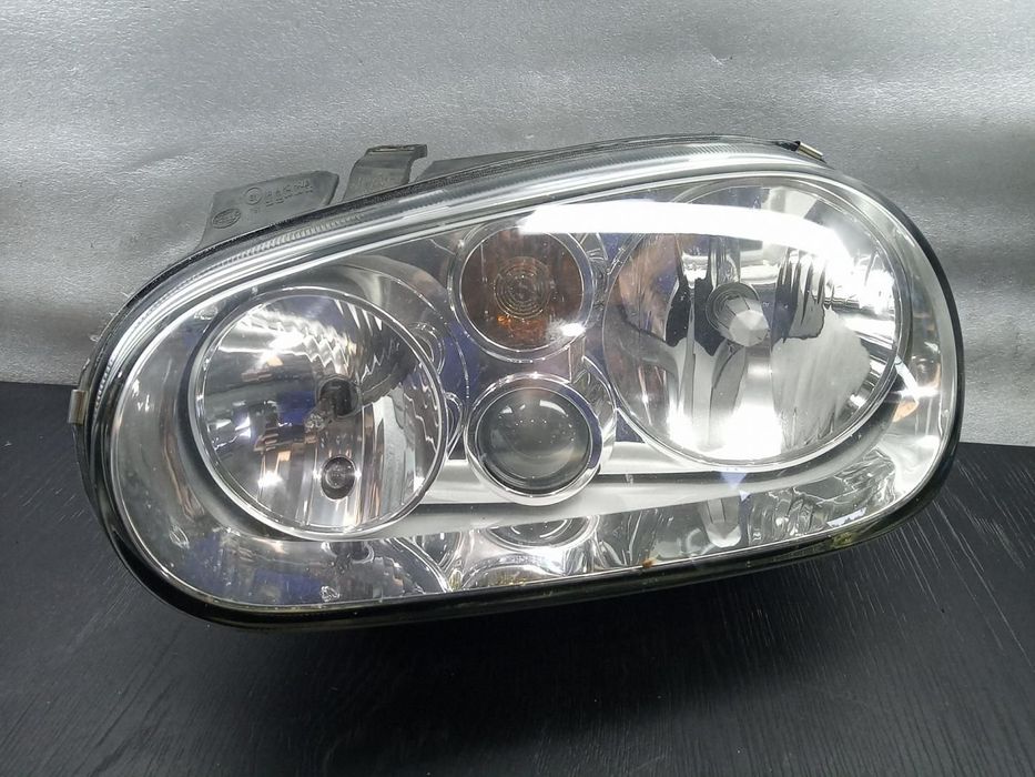 FAROL ESQUERDO VOLKSWAGEN GOLF IV BERLINA 1J110.1997