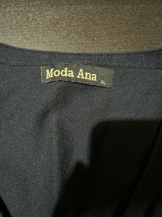 Casaco malha azul escuro