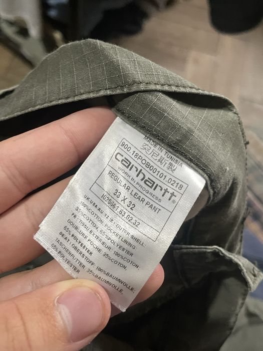 Джинси кархарт з дефектами