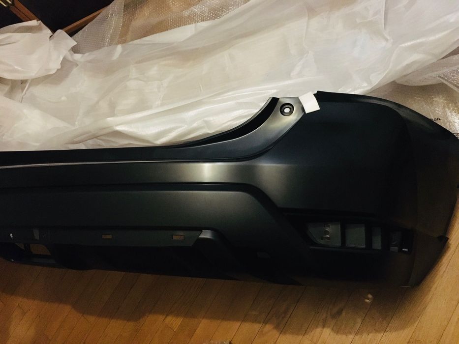 Бампер задний Ниссан X-TRAIL ROGUE оригинал новый