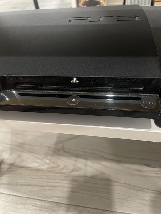 Playstation 3 Slim + 14 jogos + comando + cabos
