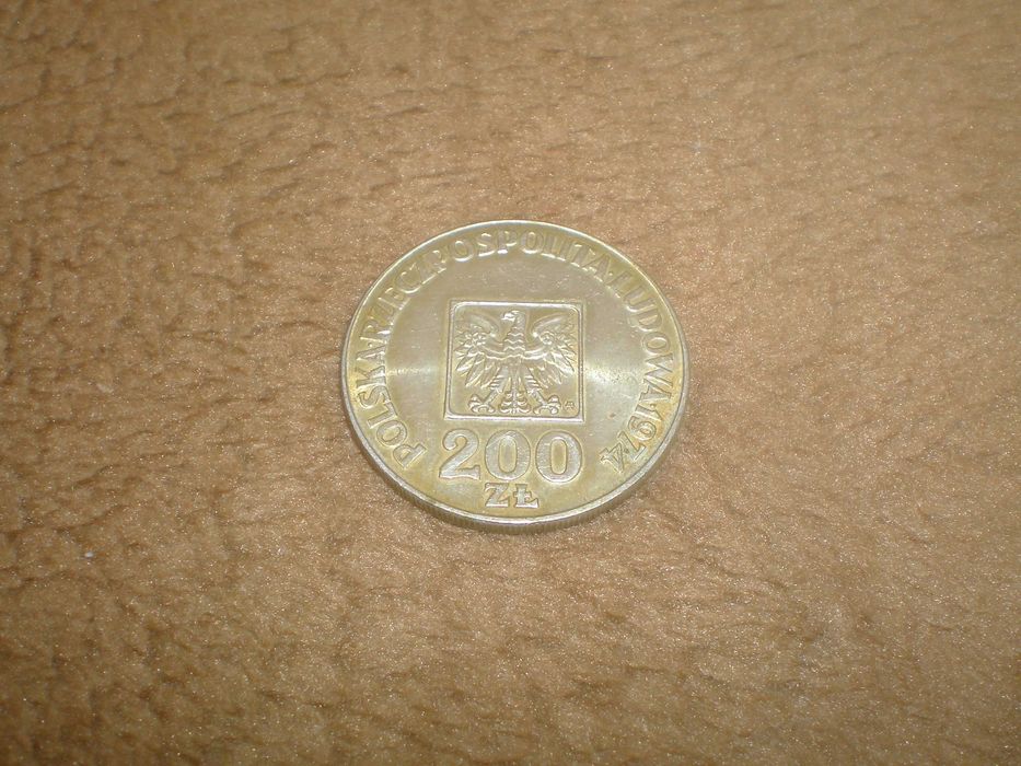 Sprzedam monetę 200 zł., z roku 1974r., XXX Lat PRL używana cena 90 zł