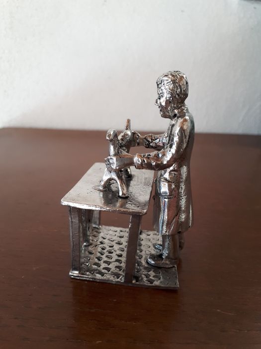 Boneco de estanho 95% Veterinário