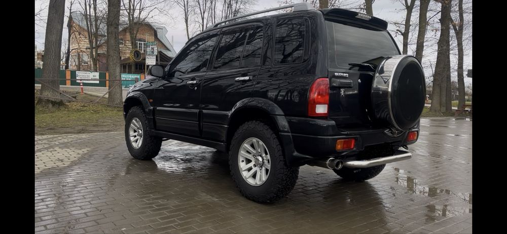 Підножники та задня труба сузукі гранд вітара 2005р.