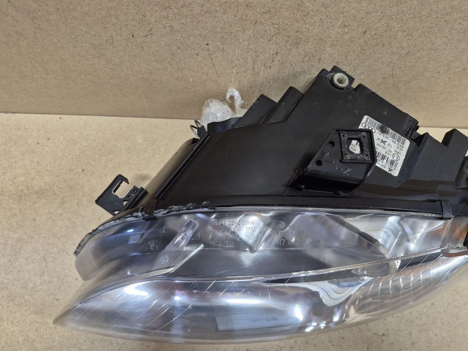 Lampa reflektor audi A4 b7 lewy europa cala