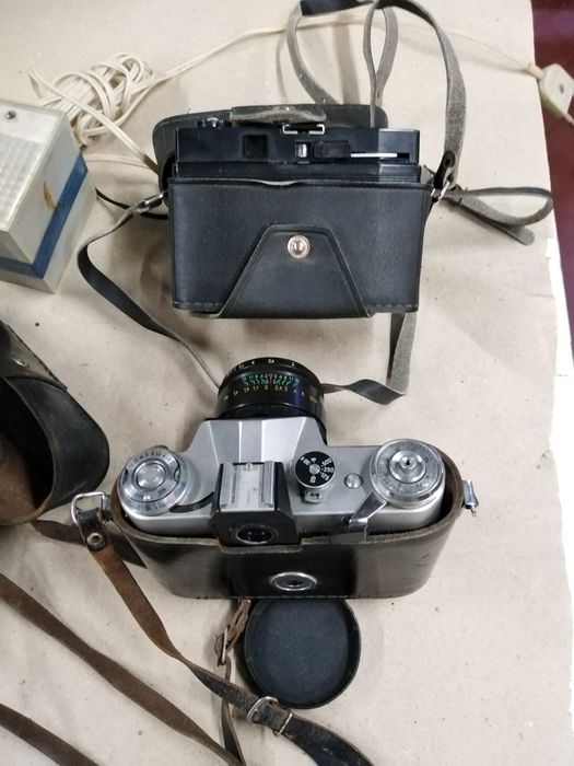 Фотоапарати Зеніт Е, Смєна символ