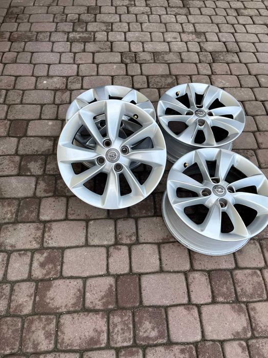 Oryginalne alufelgi Opel 4x100 15 cali Czujniki Corsa Adam Karl