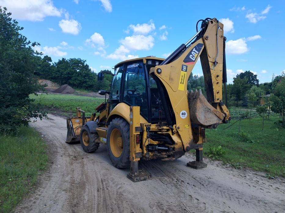 Koparko ładowarka cat 428 e