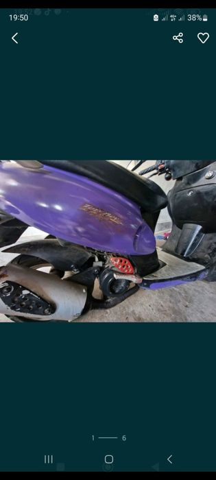 Moto scooter roxa