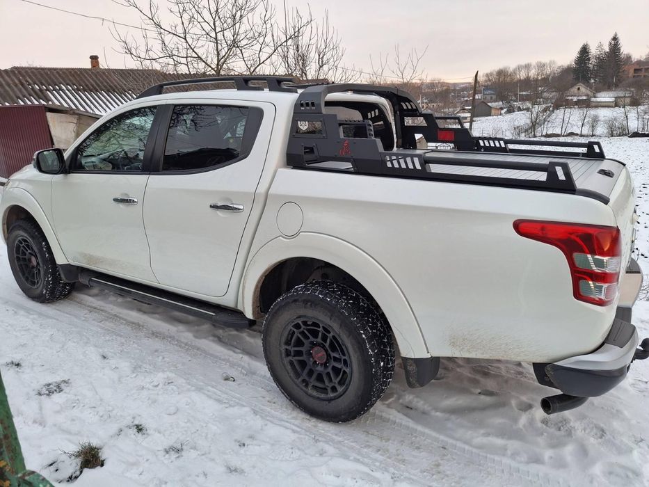 Роллбар без роллетов Omsa Line для Mitsubishi L200 2015-2023 гг. из черного металла
