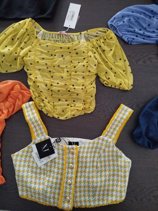 13 peças de roupa nova com etiqueta de marca Blusas/E Top 12.5€