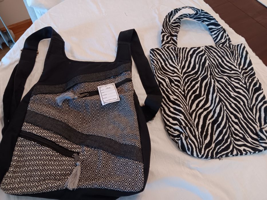 1 mochila mais saco de tecido  novos