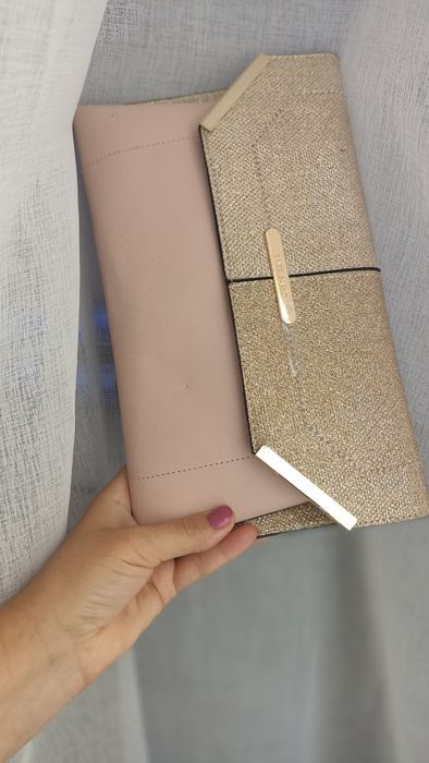 Клатч кольору пудра .