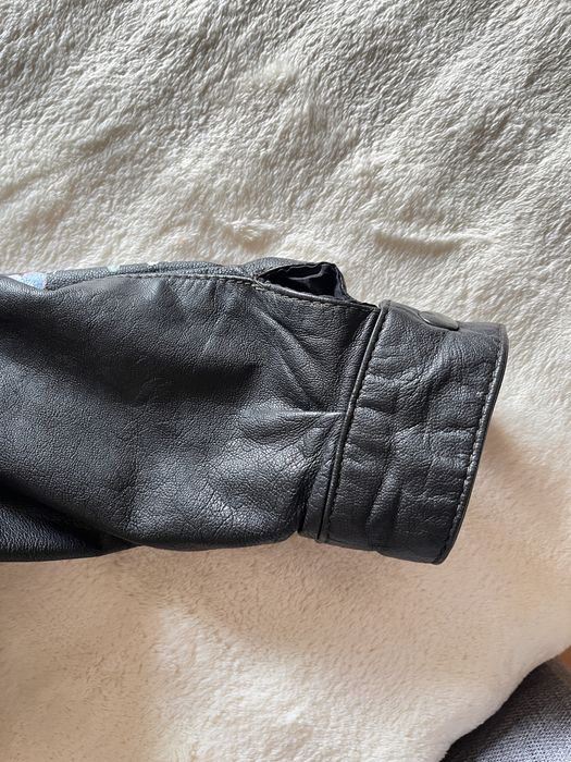 Вінтажна шкіряна куртка