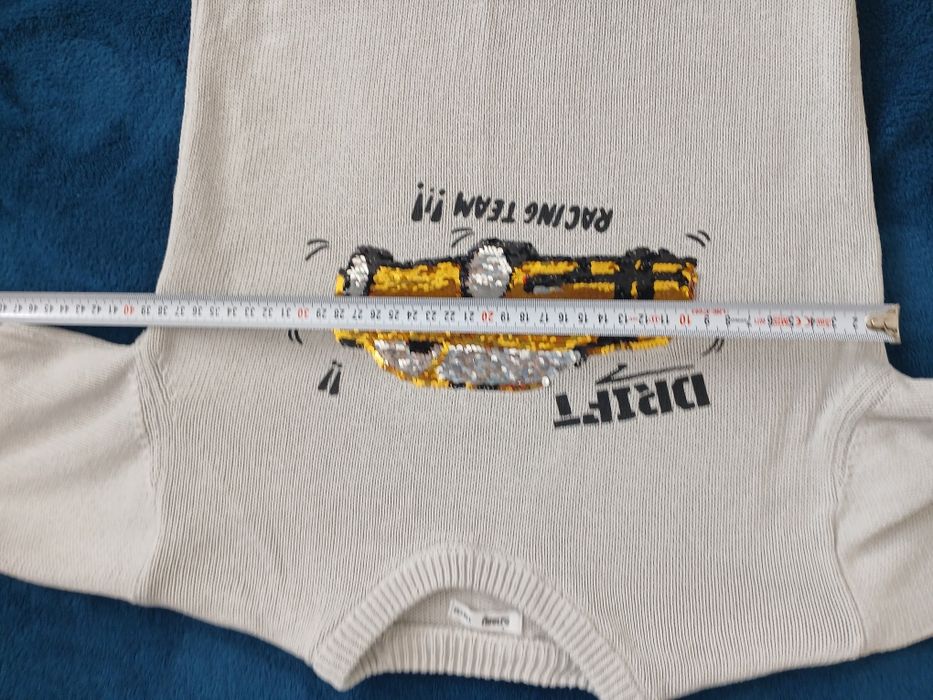 Sweter z cekinami