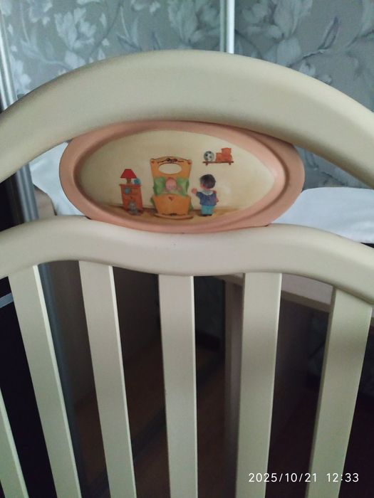 Дитяче ліжко-колиска