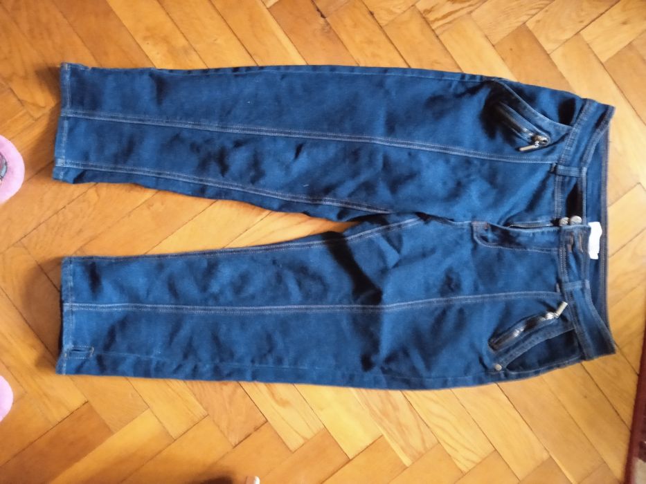 Jeansowe spodnie rybaczki 38