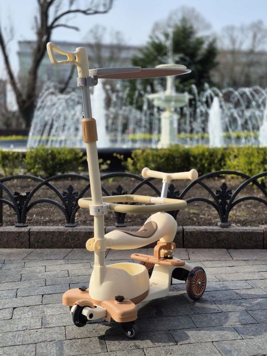 Стильний та модний самокат трансформер з батьківськой руч