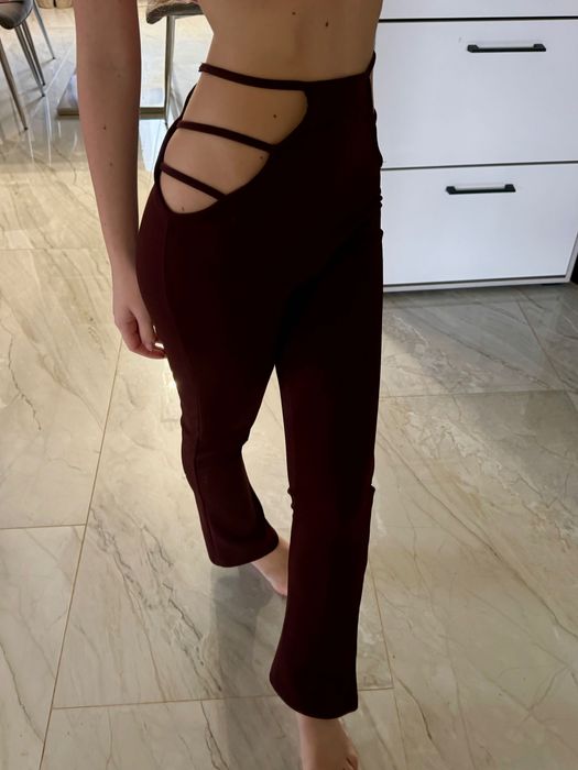 Брюки кльош бордові