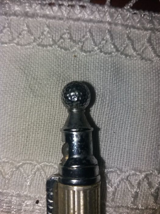 Caneta representando o Golfe com isqueiro